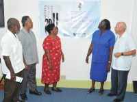Dr. James Rose, Director of Culture, Ministry of Culture, Youth and Sport, Mr. David Dewar, Chairman, Guyana Music Festival Committee, Meighan Duke, Committee Member, Marilyn Dewar, Musical Accompanist and Dr. Erv Jannsen, Coordinator, Music Education Program, Partners in Mission with the Evangelical Lutheran Church in Guyana examining the backdrop for the official launch of the 16th Guyana Musical Arts Festival 2011.
